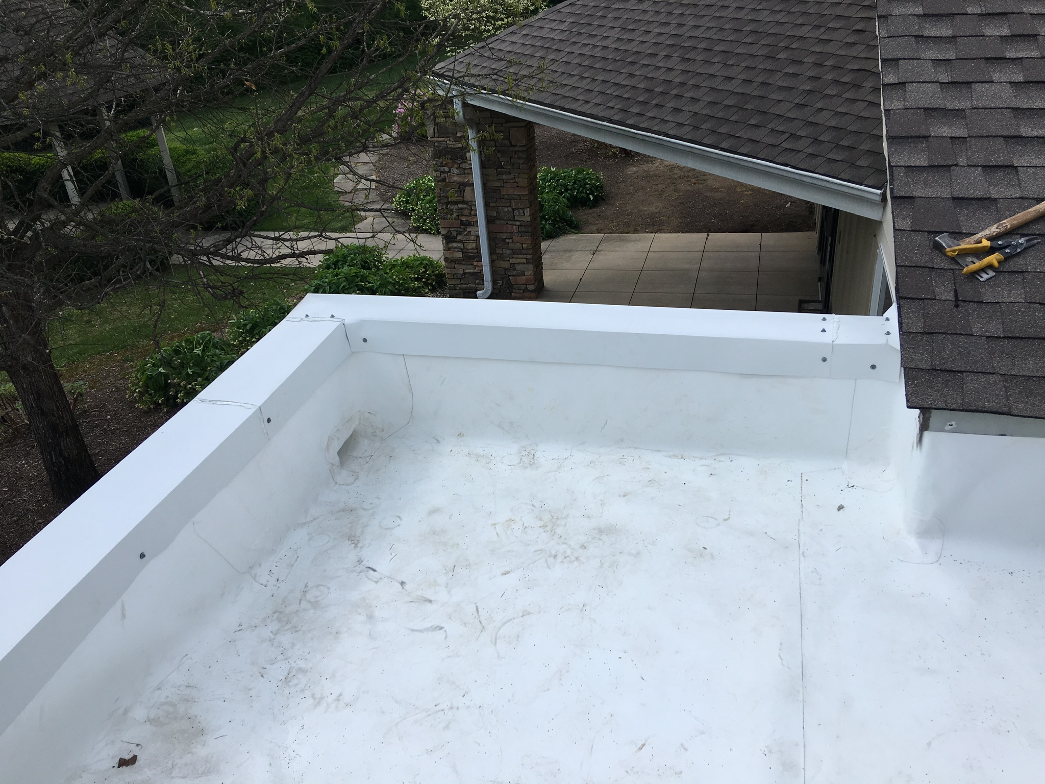 This is an overview of the completed installation of the white TPO membrane roof.