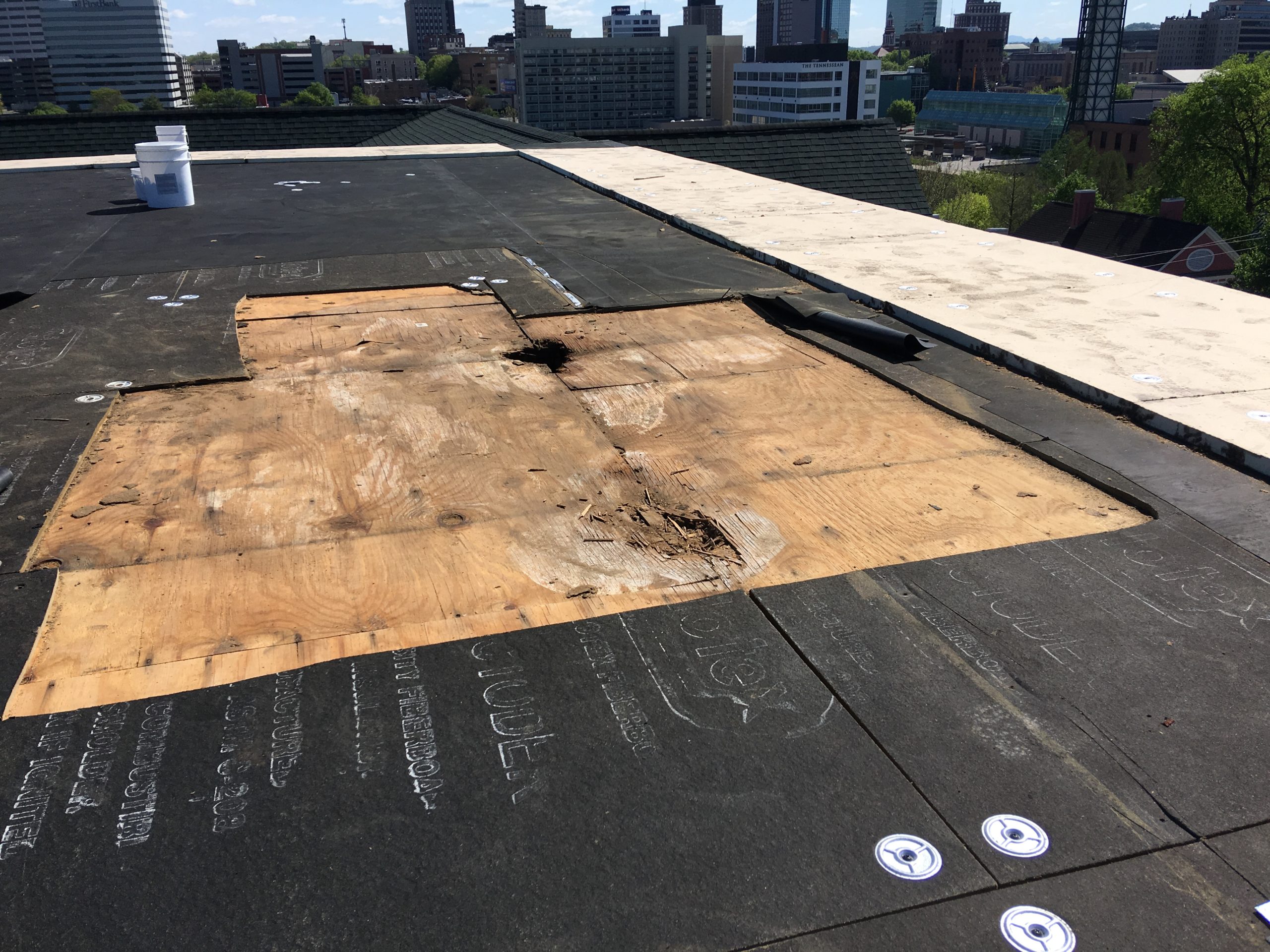 This is a view of rotten deck boards on the roof.