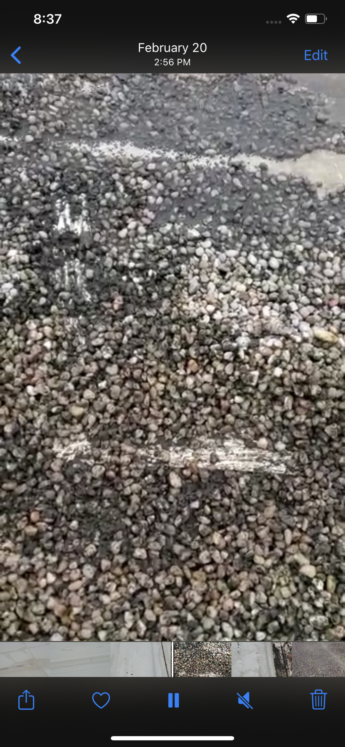 This is a close up image of a chip and gravel portion of the roof. 