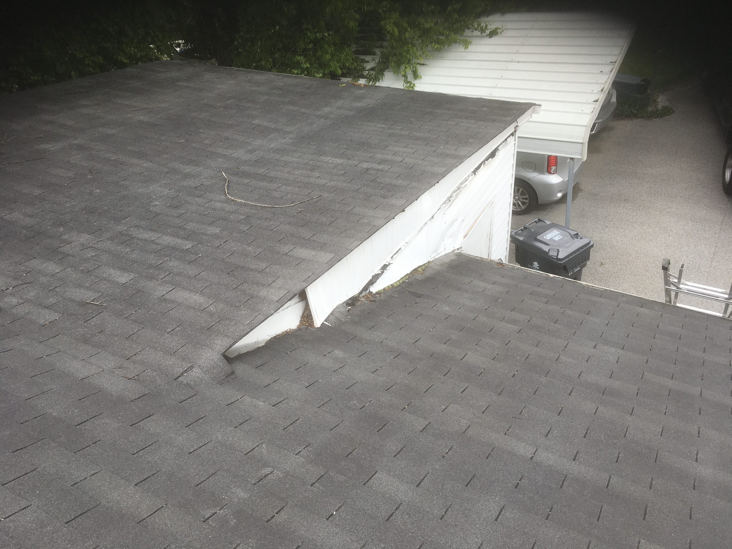 This is a picture of white roof siding that is not in place.  