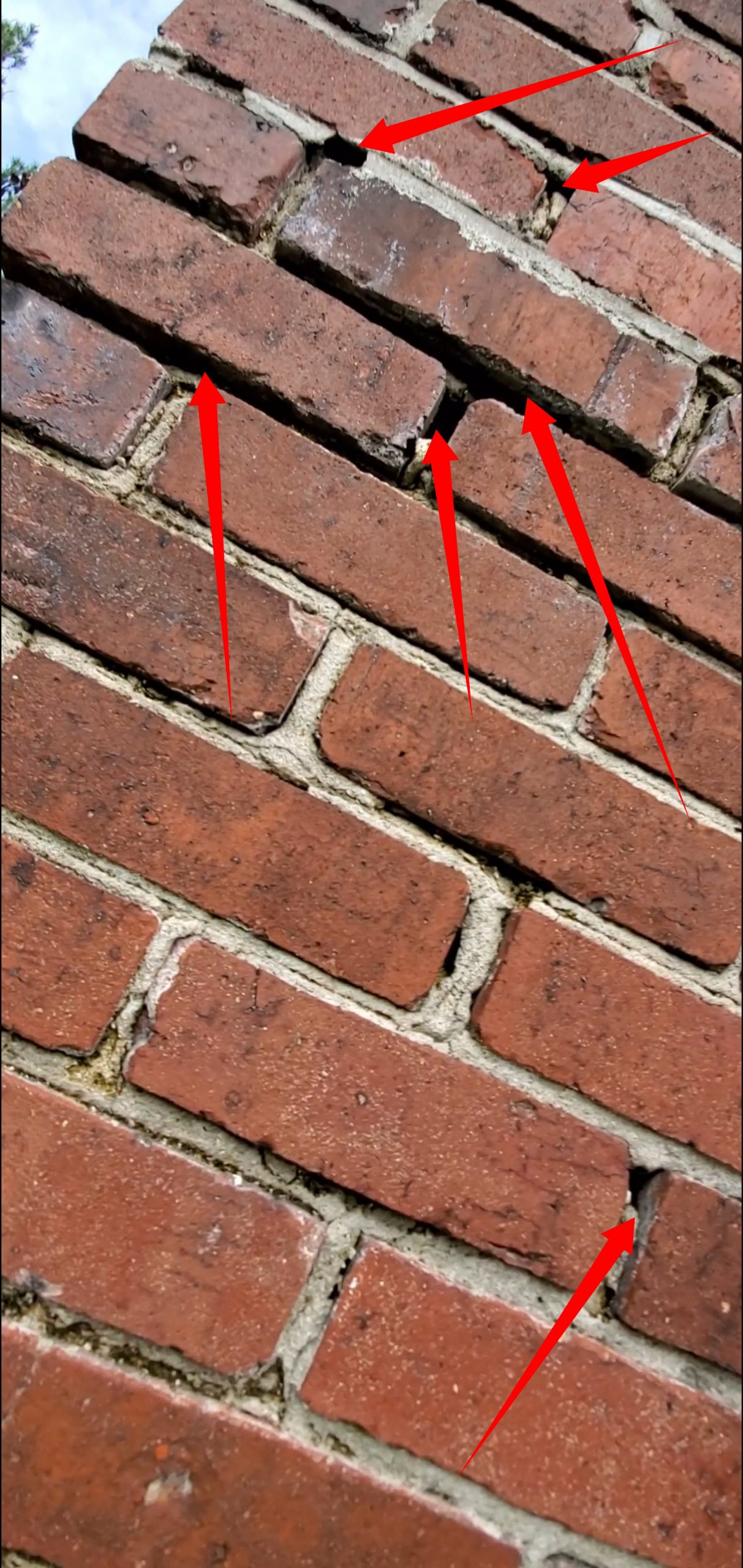 This is a picture of Holes and cracks in brick and mortar