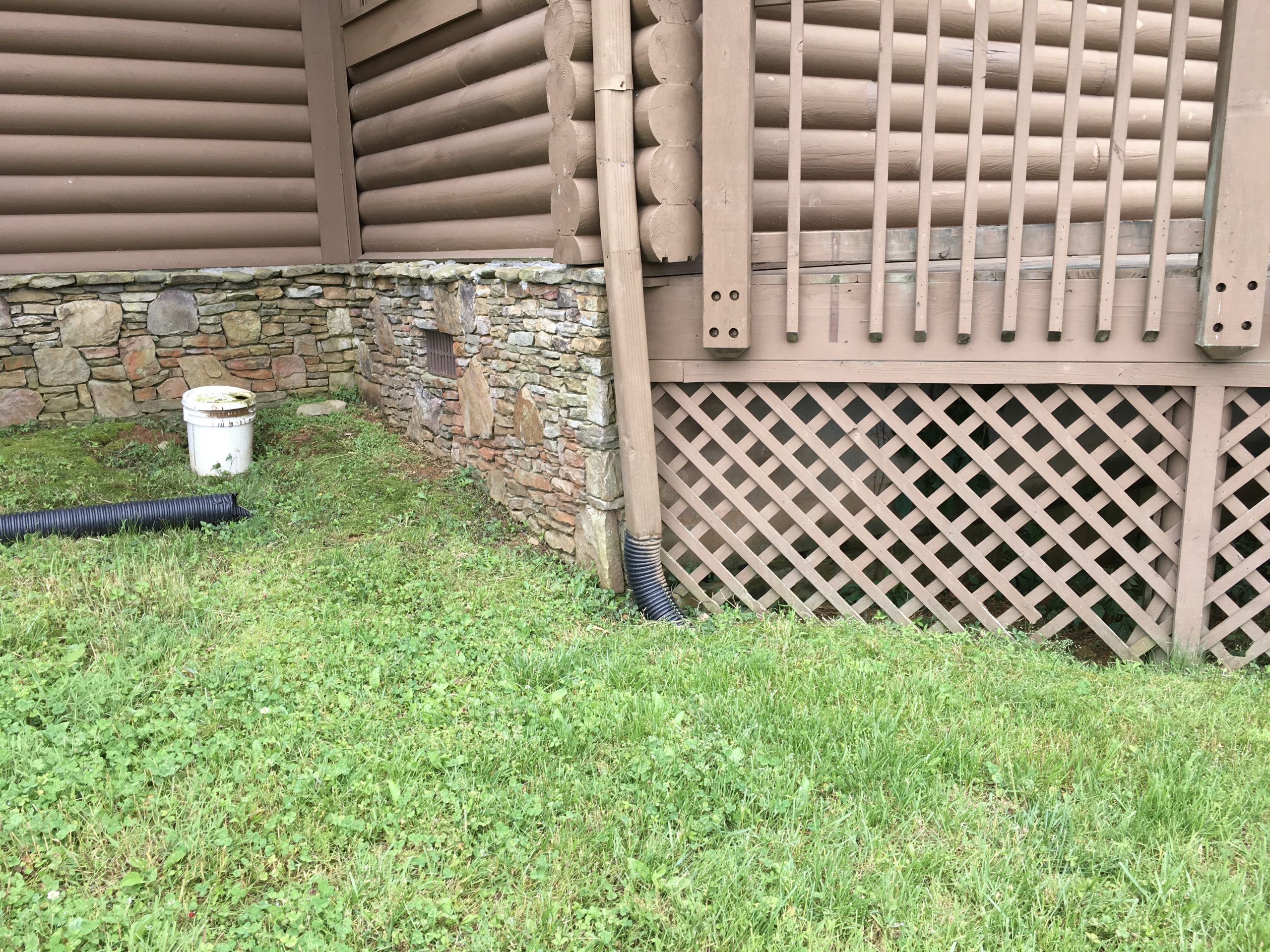This is an image of downspout at the rear of the house. 