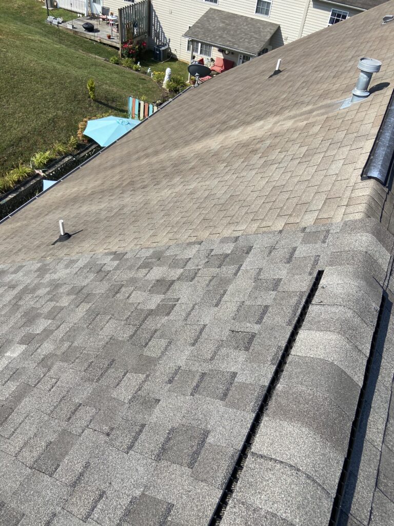this is a picture of an old roof next to a new dimensional shingle that litespeed construction installed in knoxville tn