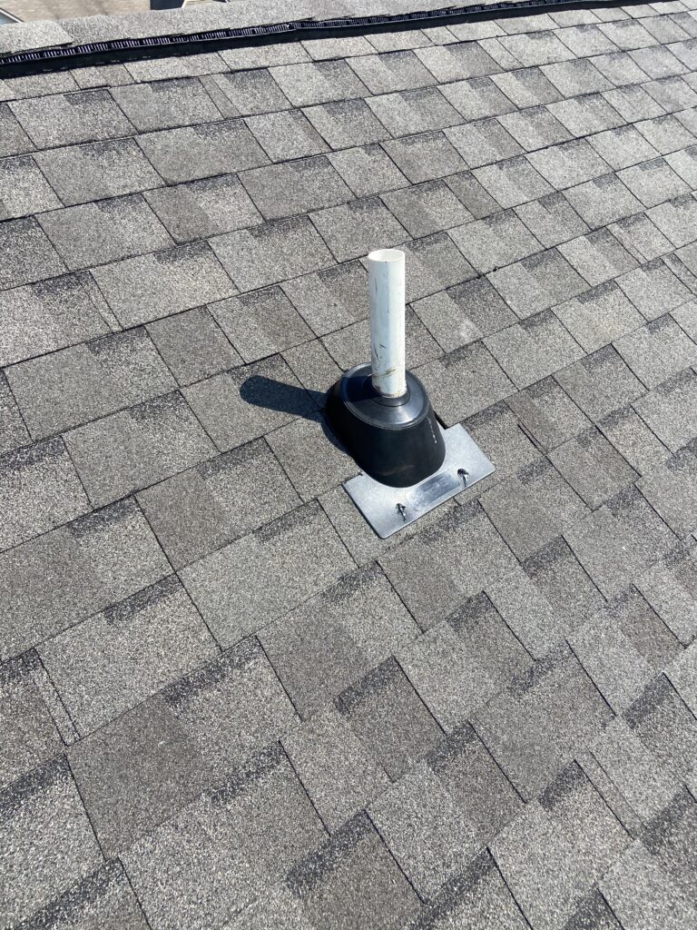 this is a picture of a new pipe boot and tamko heritage weathered wood shingles that were replaced by litespeed construction