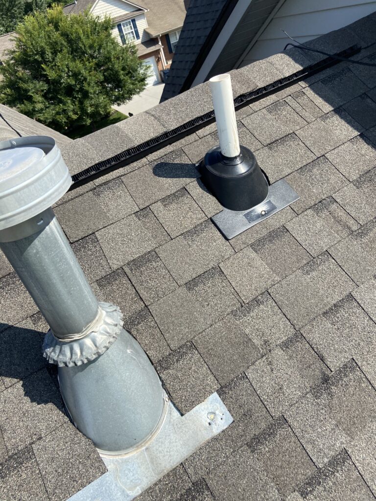 this is a picture of a new pipe boot that was installed when litespeed construction replaced this roof 