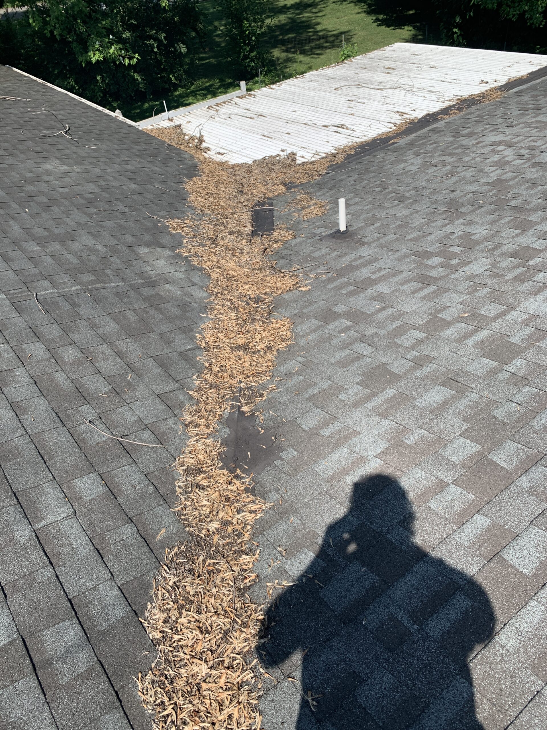 Roof Leaks are Occurring Where a Porch Roof Meets a House in Knoxville TN