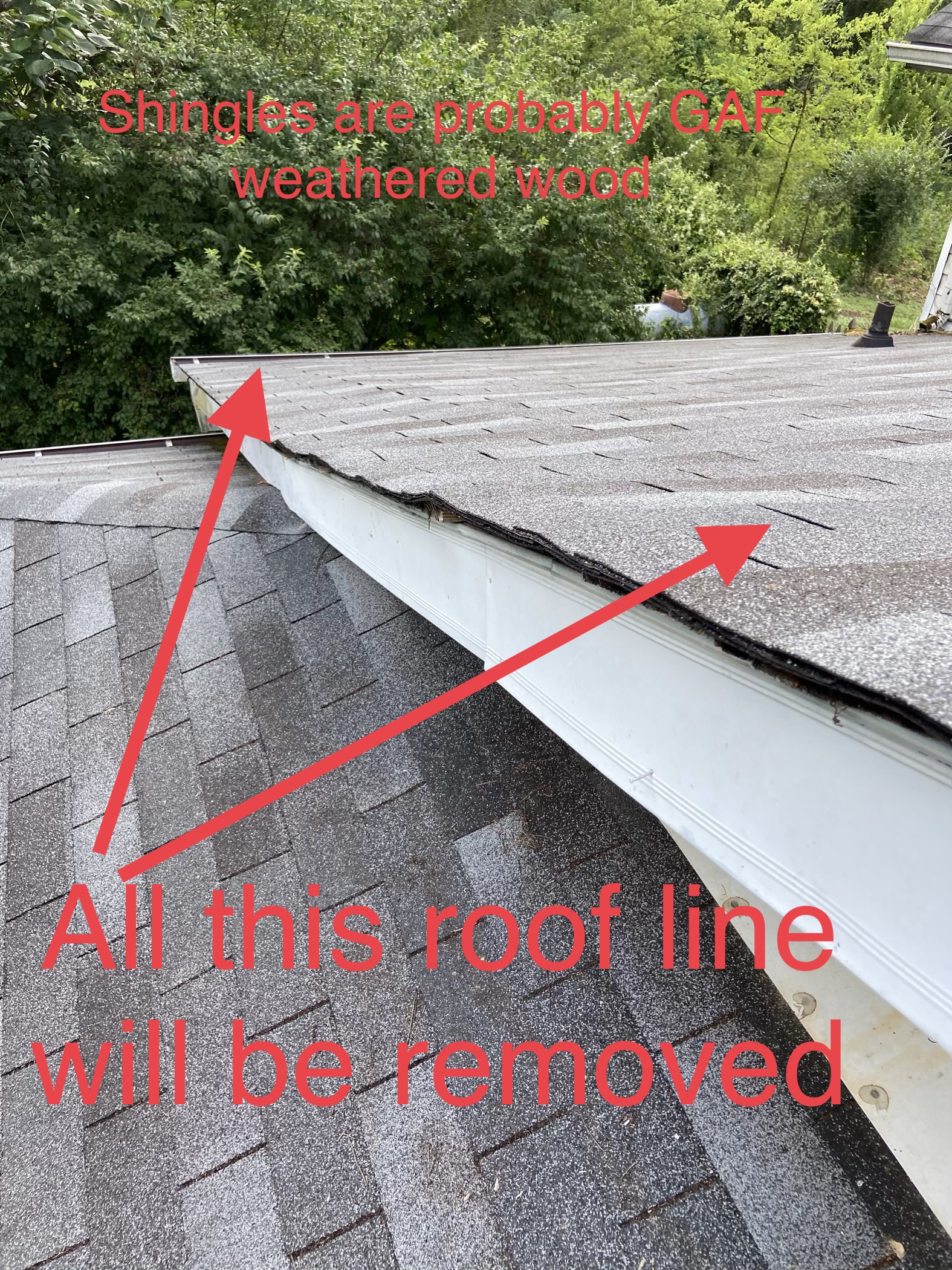 this is a picture of the roof slope mentioning via text in the photo that this entire roof line will need to be removed