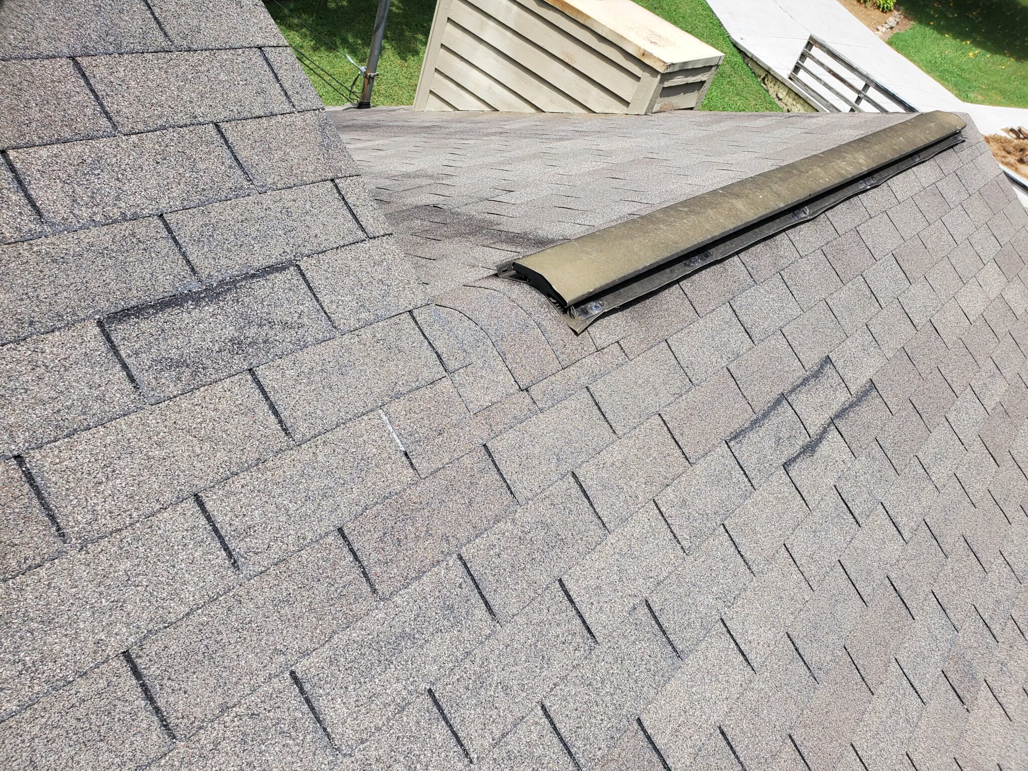 Storm Damages to this Roof are Caused by High Winds in Knoxville TN