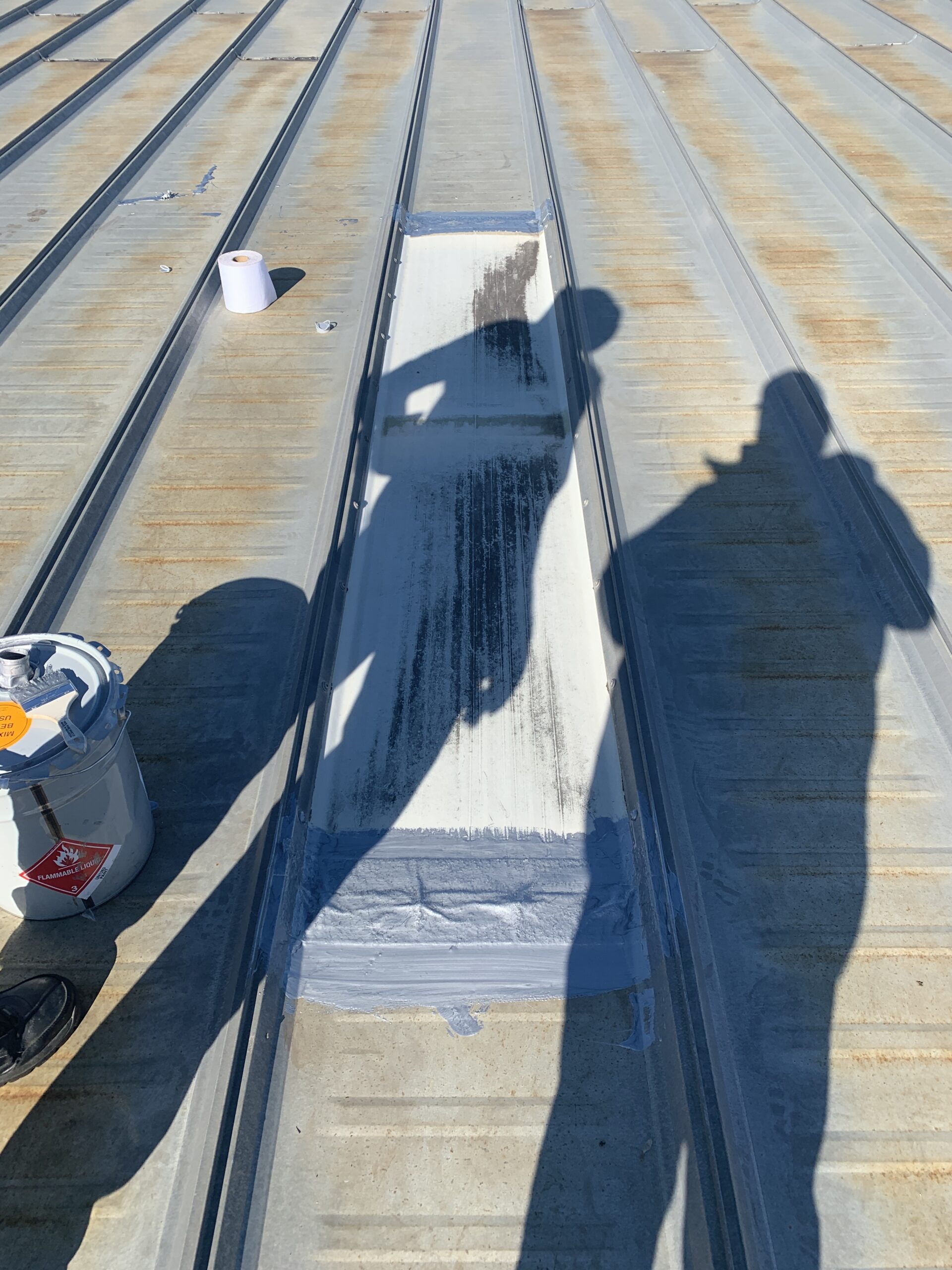 this is the aldo 385 product coating around an old skylight on a metal roof