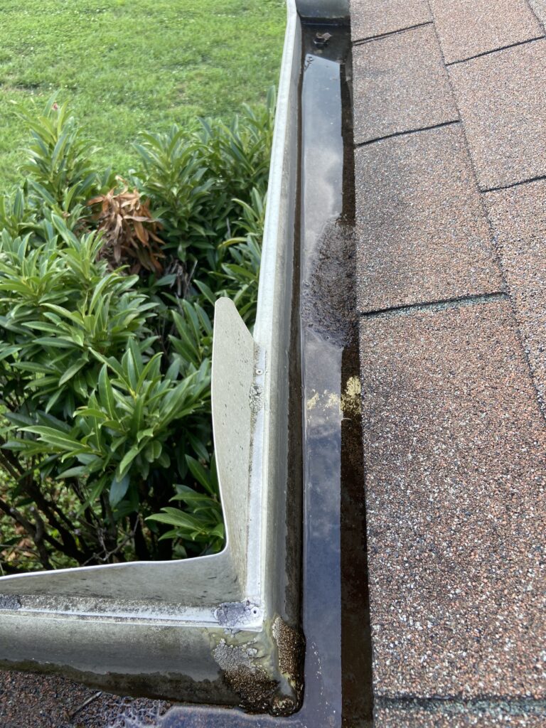 view of a gutter with Standing water 