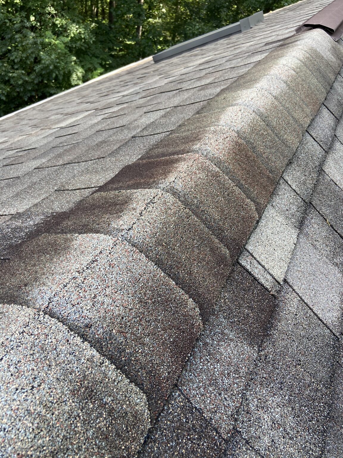 Cracking Roof Shingles at Ridge of Roof - Litespeed Construction Knoxville