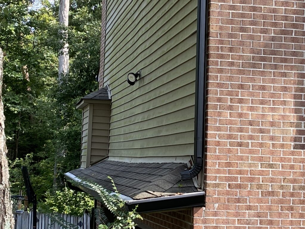 Siding is leaking here and causing problems Litespeed Construction