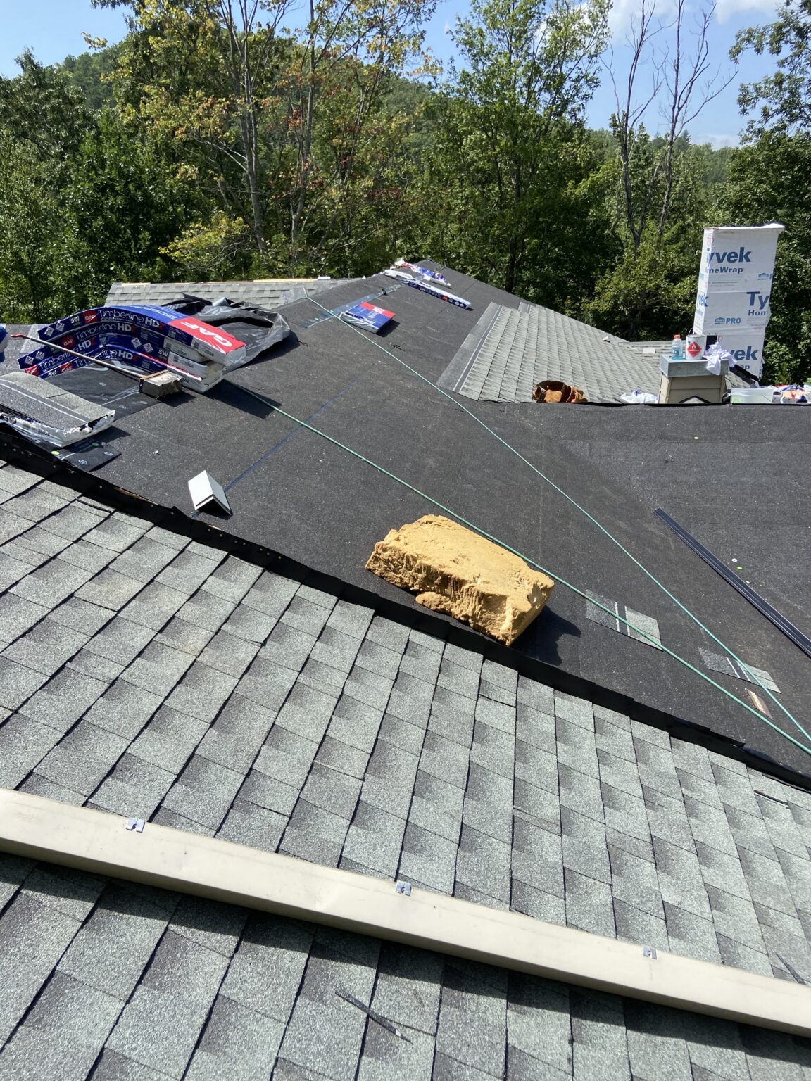 Ice and Water Underlayment and GAF Shingles are Getting Installed Litespeed Construction Knoxville