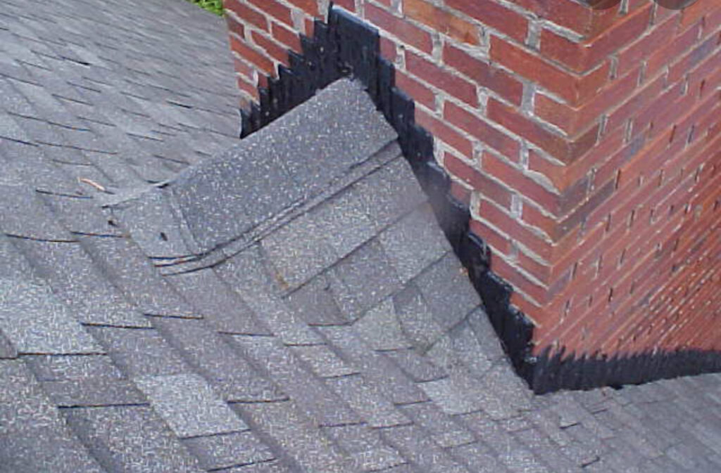 Leaking chimney flashing and needs a cricket Litespeed Construction Knoxville