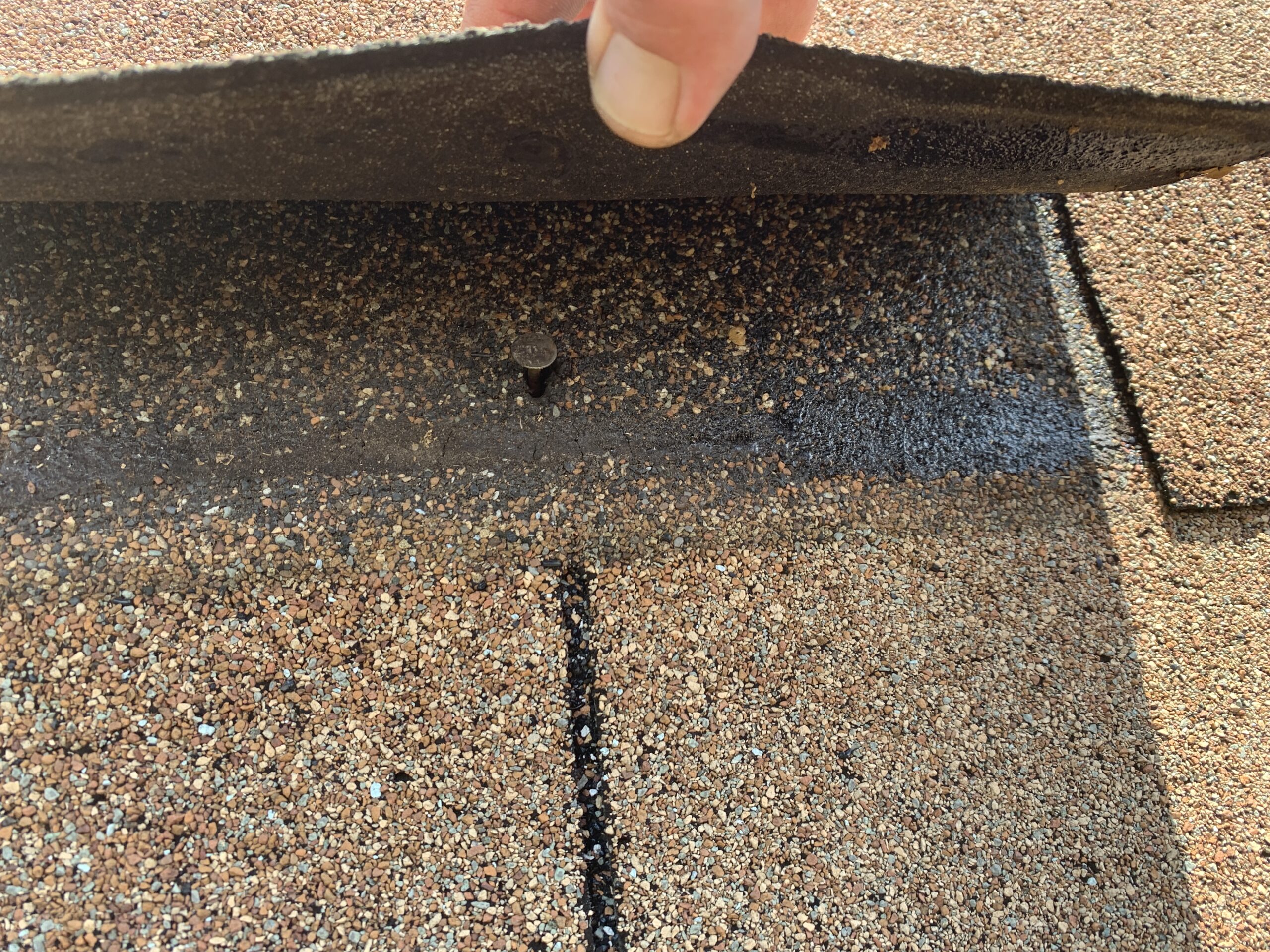 Do you laminated shingles on an old three tab shingle roof in need of replacement. The shingles are no longer glued together at the nail line
