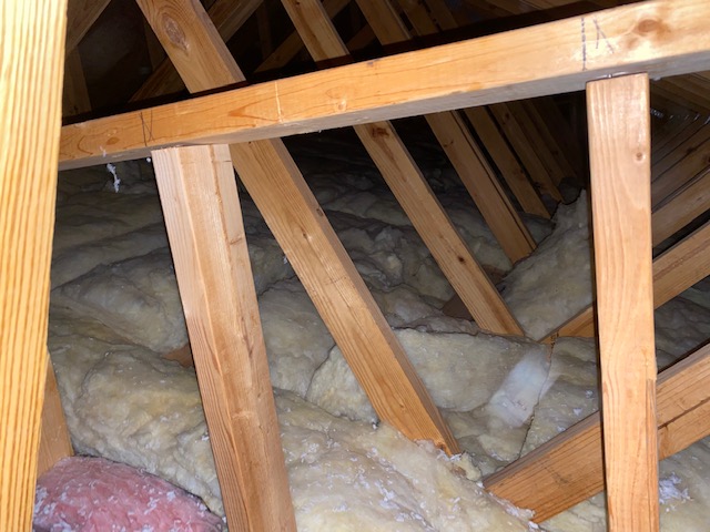 This is the attic where the tubing for the sun tunnel will. E installed