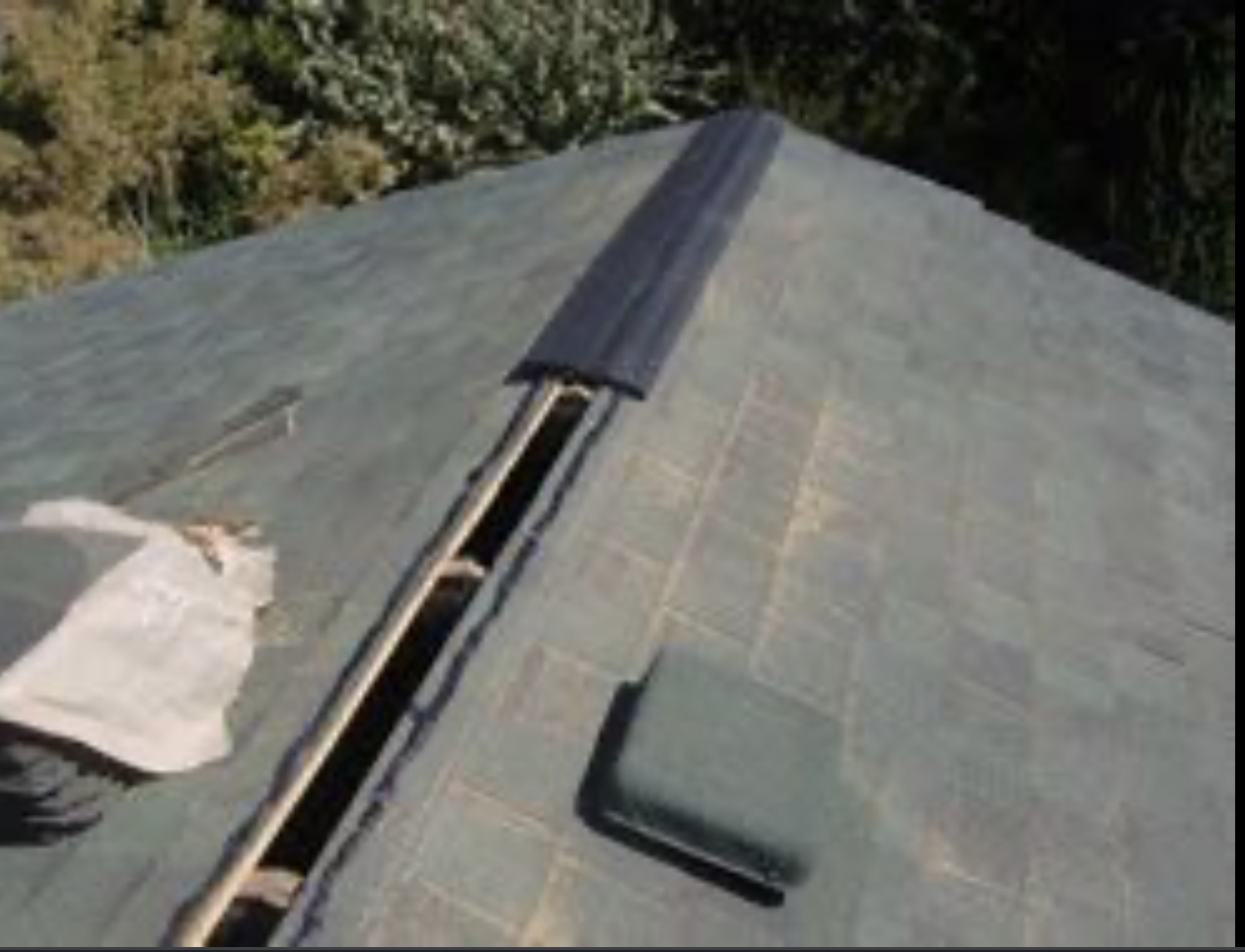 Ridge vent and ridge cap allow hot air to escape from the highest points of the attic while keeping water out and looking spiffy