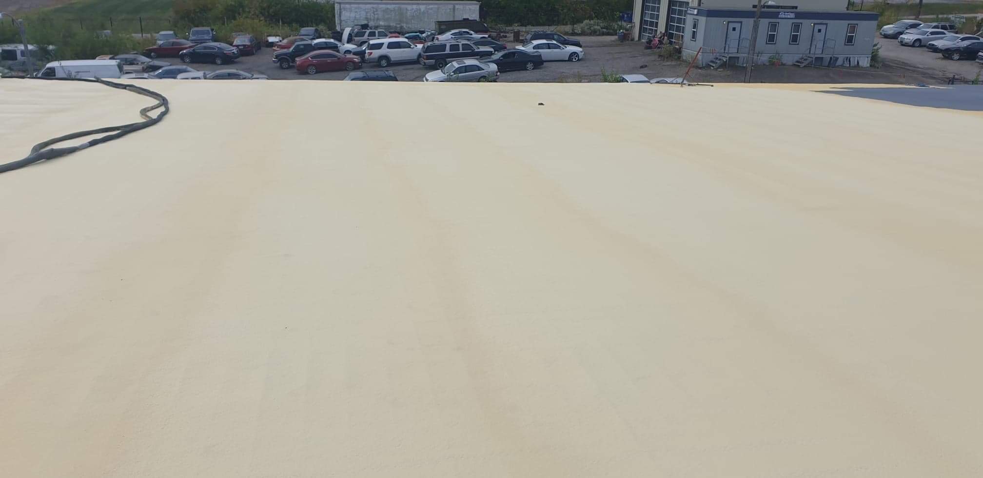 This is what a roof coating looks like after it has been applied by Conklin roofs in Knoxville Tennessee