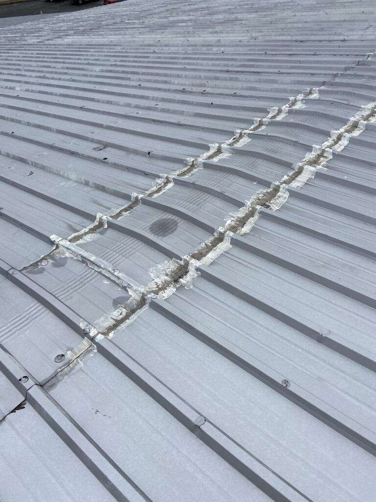 This is the ridge of a metal roof that has leaks