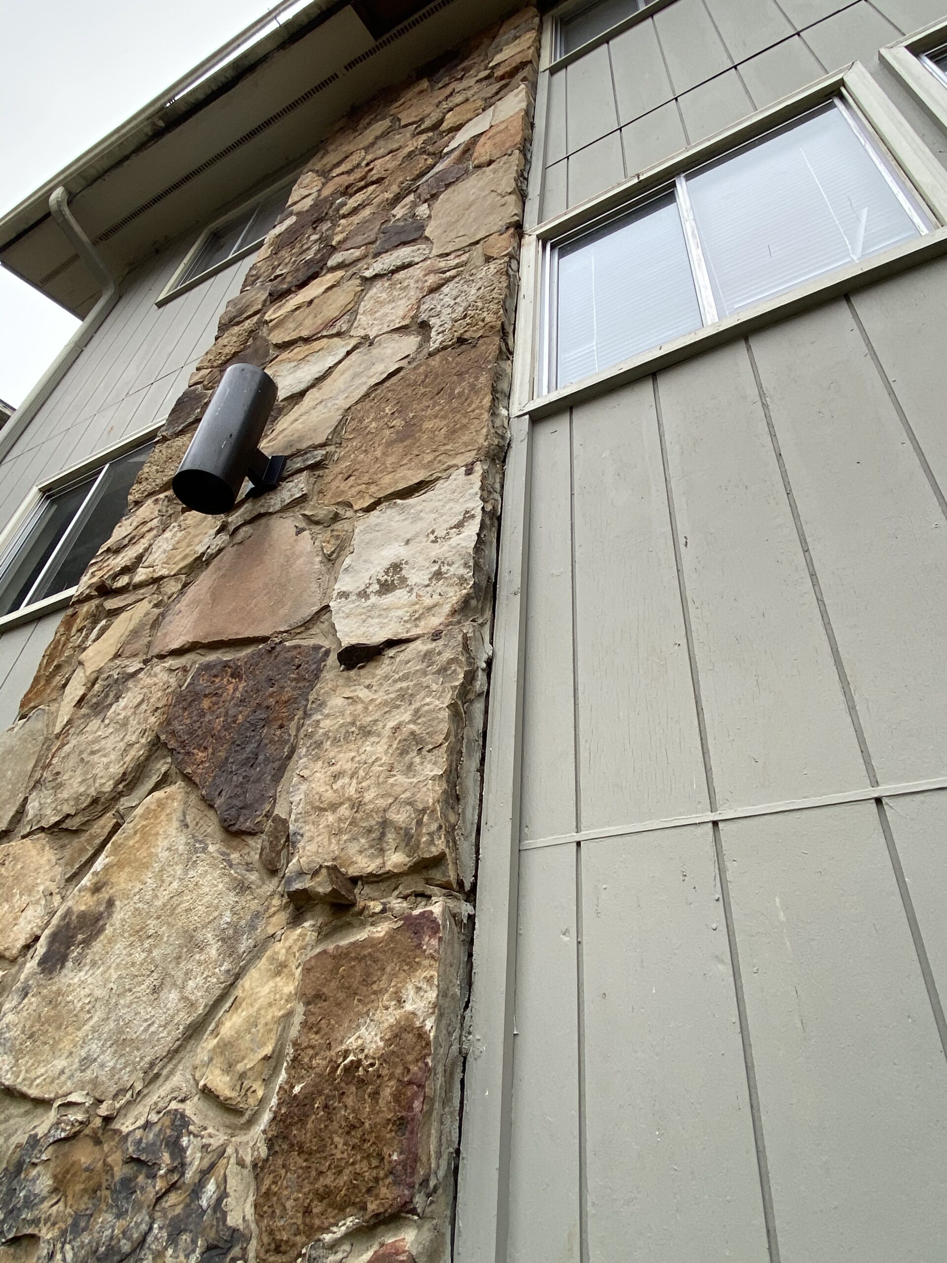 This is a picture of Stackstone siding next to T1 11 siding on a mark apartment complex in Knoxville Tennessee