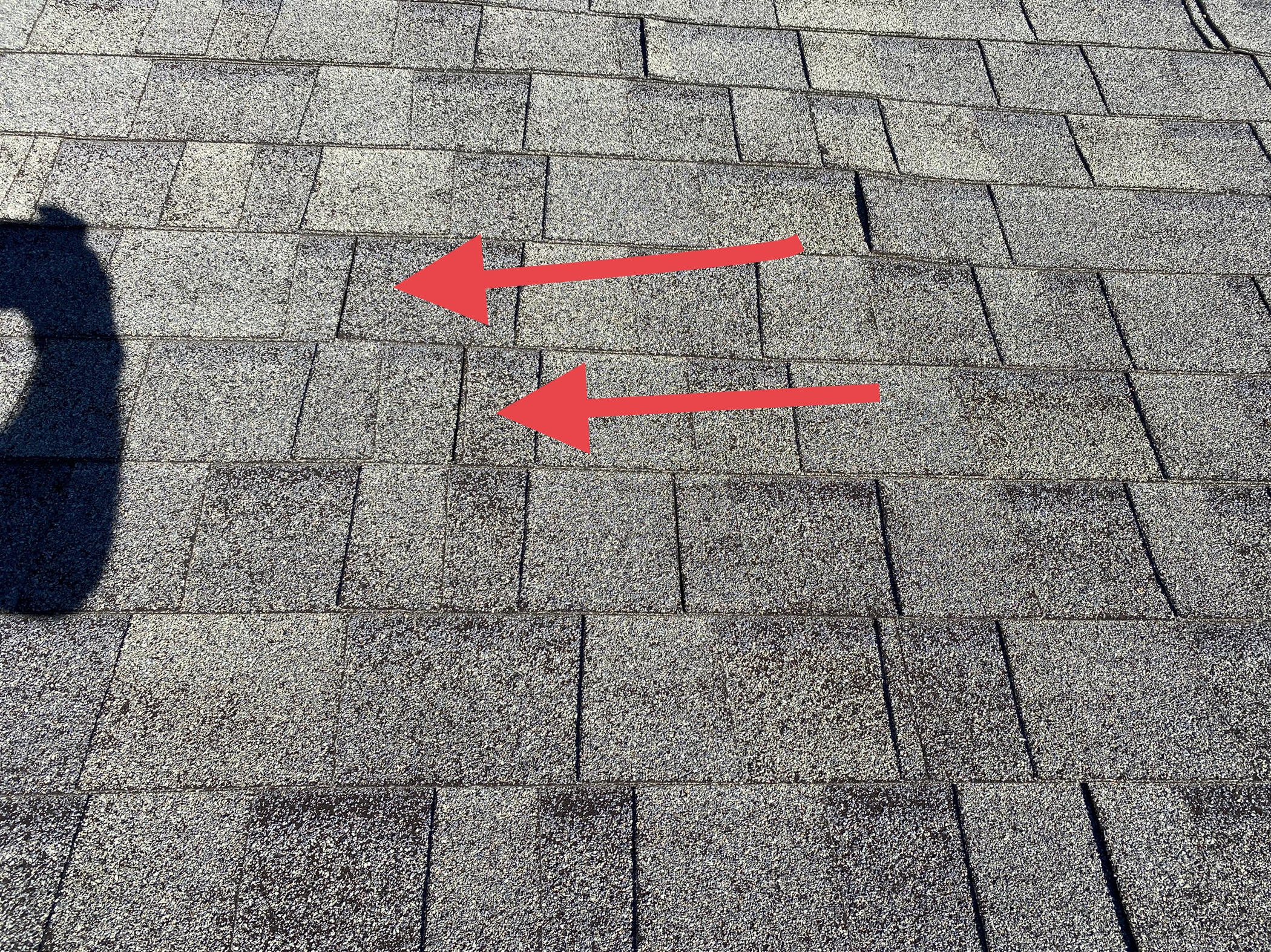 This is a picture of a gray shingle with arrows showing the unions
