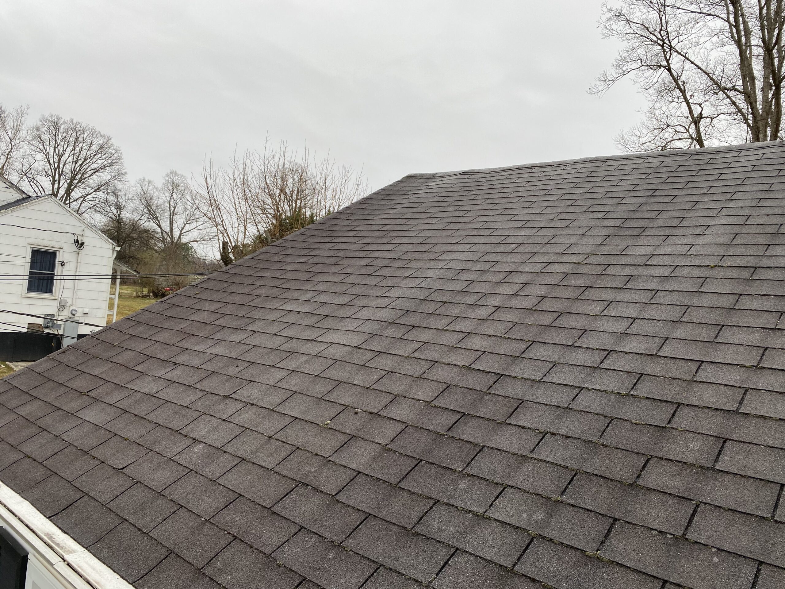 This is a picture of an old gray three tab roof