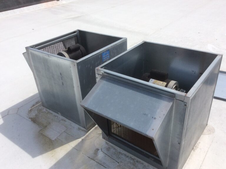 This is a view of AC units on a white flat roof