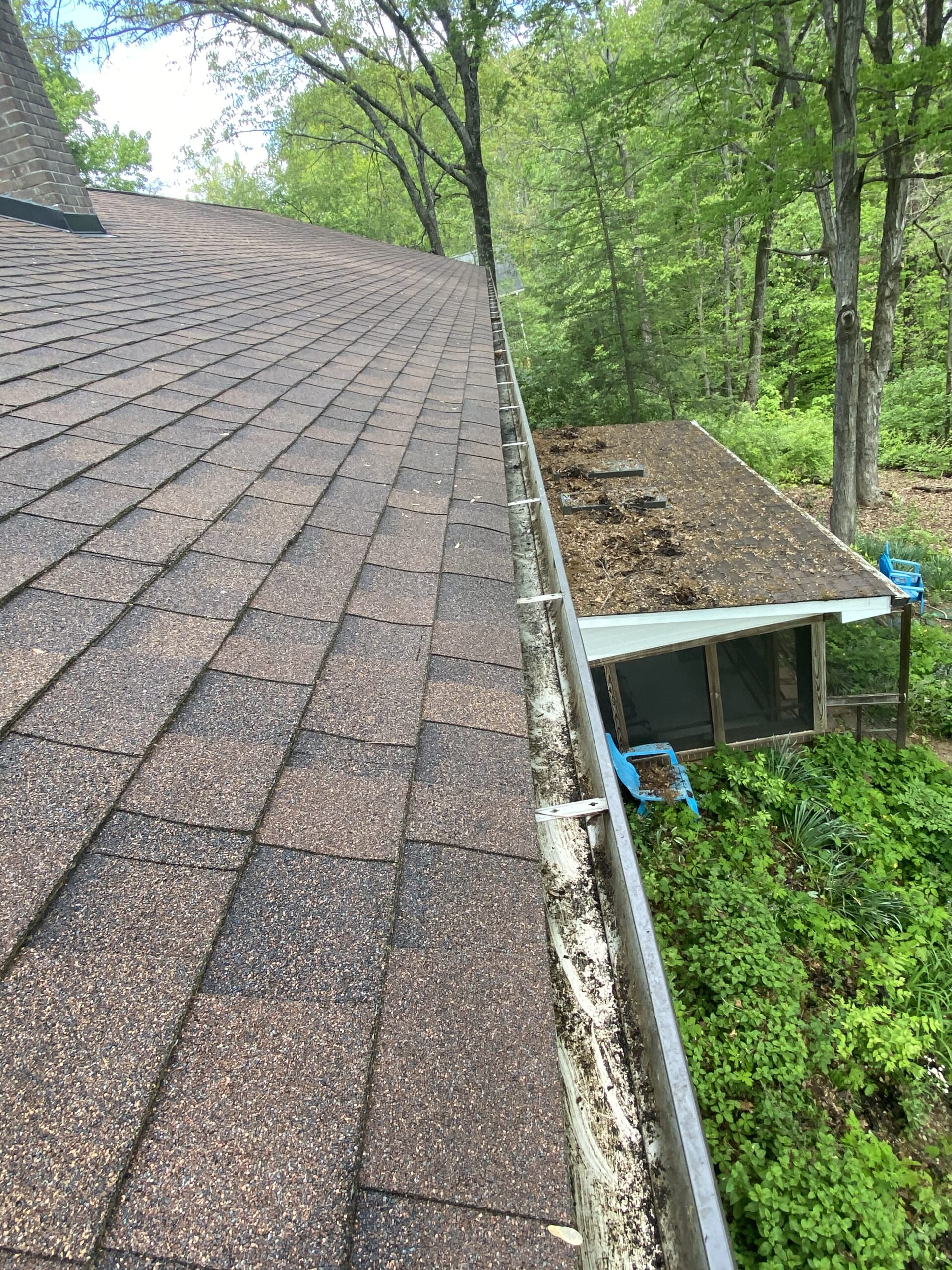 This is a picture of a gutter that has been cleaned out