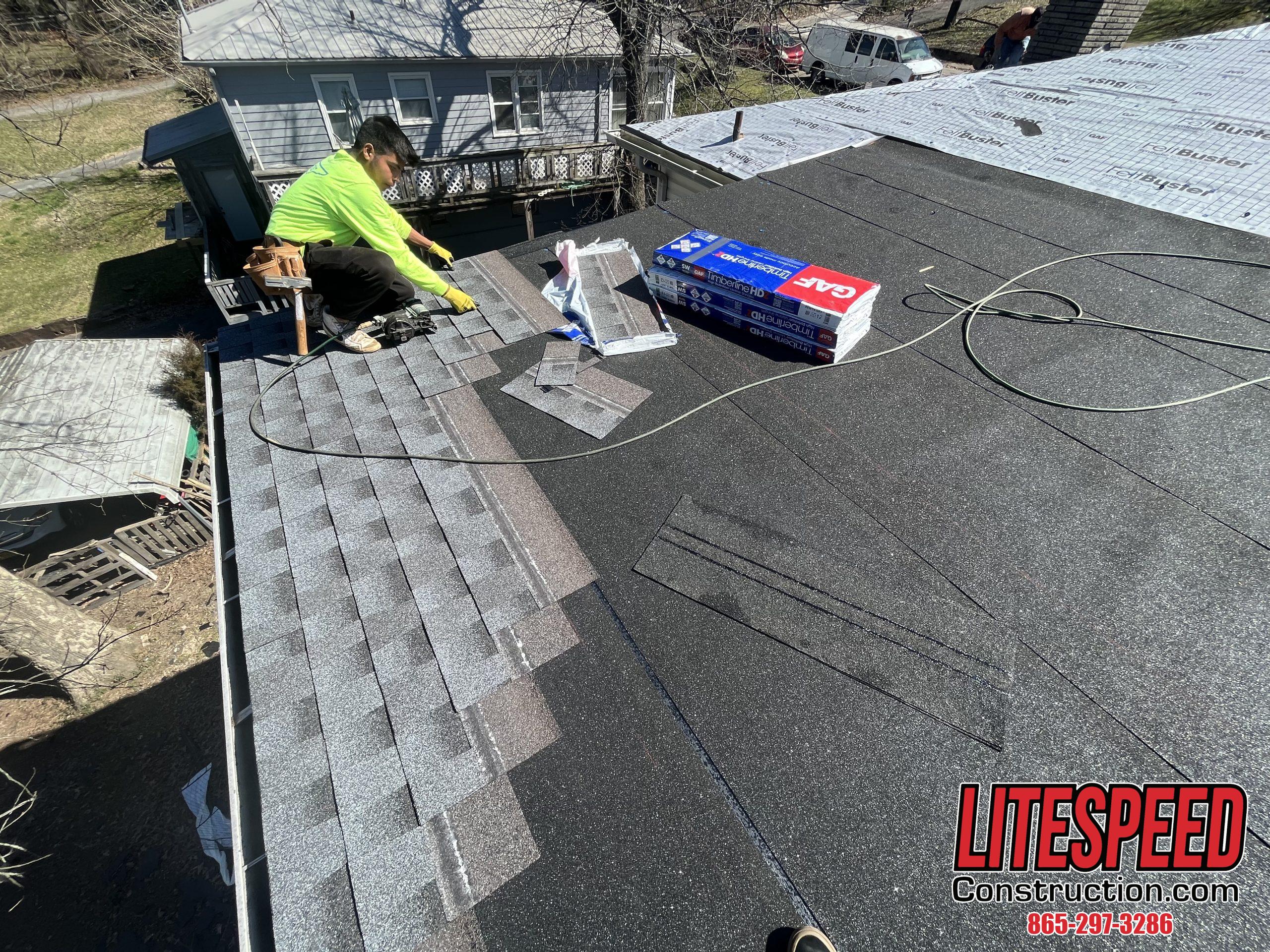 This is a picture of shingles being laid over ice and water shield 