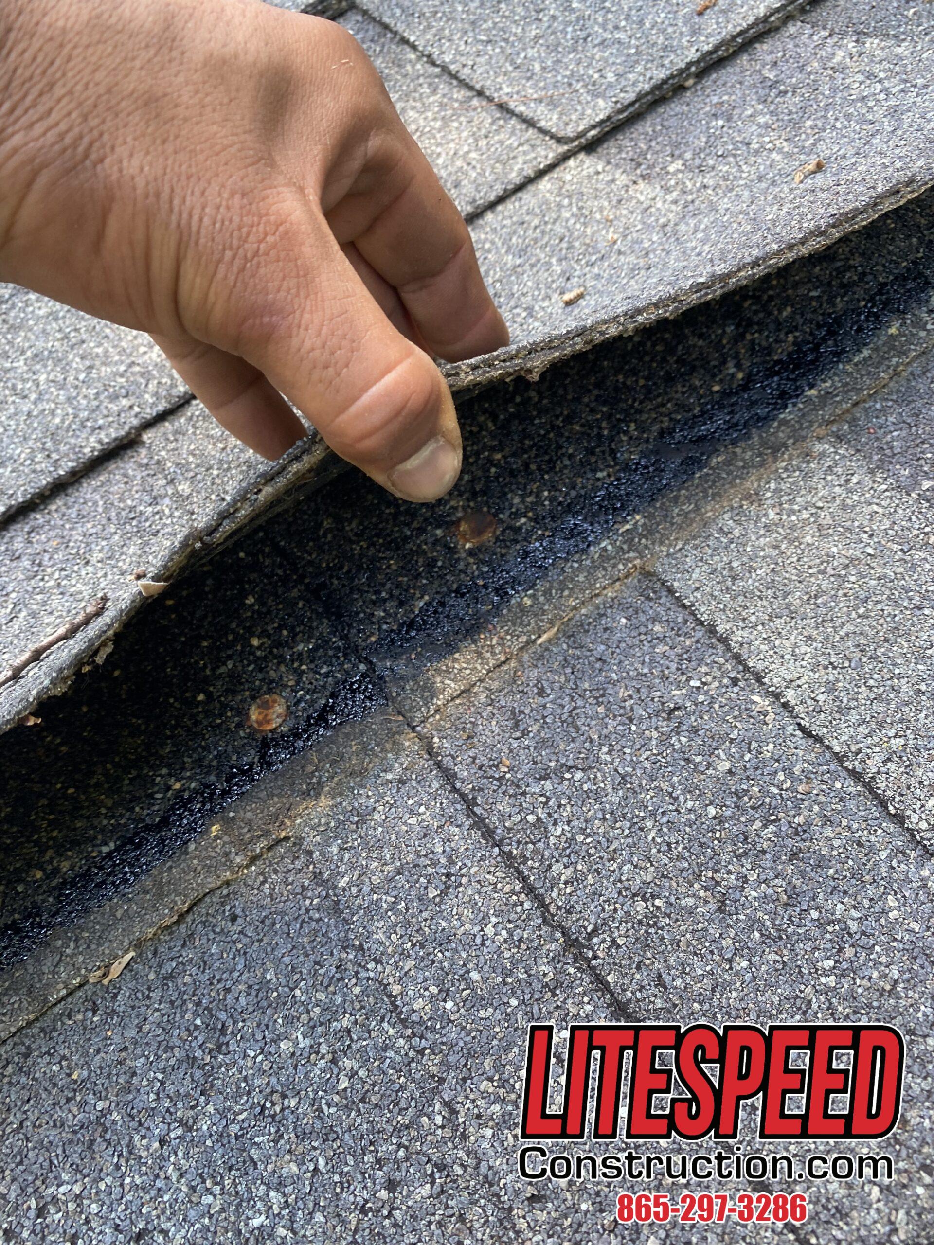 This is a picture of rusty nails underneath the shingles.