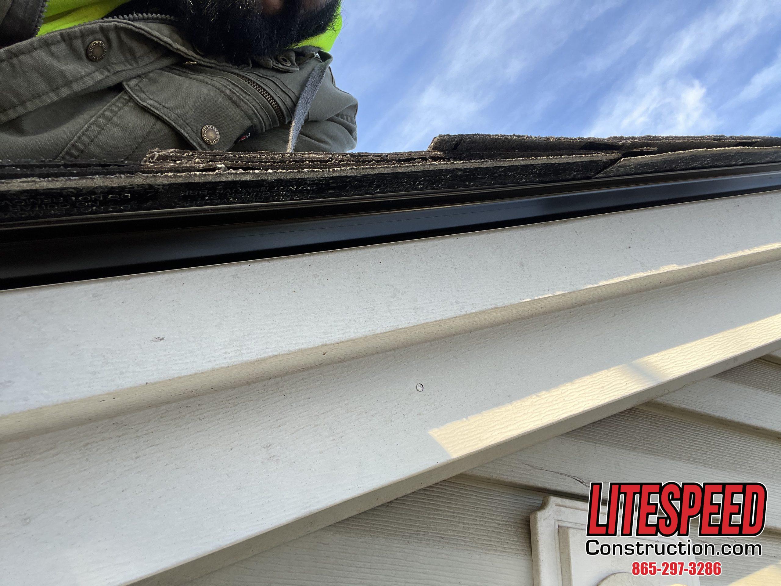 This is a picture of drip edge at the edge of the roof
