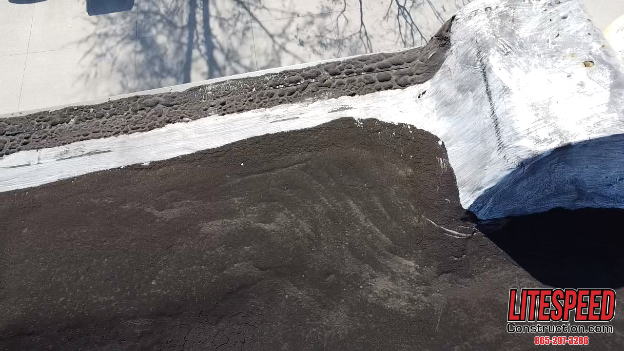 inspecting an old commercial roof in Knoxville TN, commercial roof inspection Knoxville, professional roof inspection Knoxville TN, old roof maintenance Knoxville, roofing contractor Knoxville TN, commercial roof damage assessment Knoxville, roof inspection services Knoxville TN, affordable roof inspection Knoxville, roof maintenance for old commercial roofs, roof replacement evaluation Knoxville TN, commercial roofing solutions Knoxville, old roof repair Knoxville TN