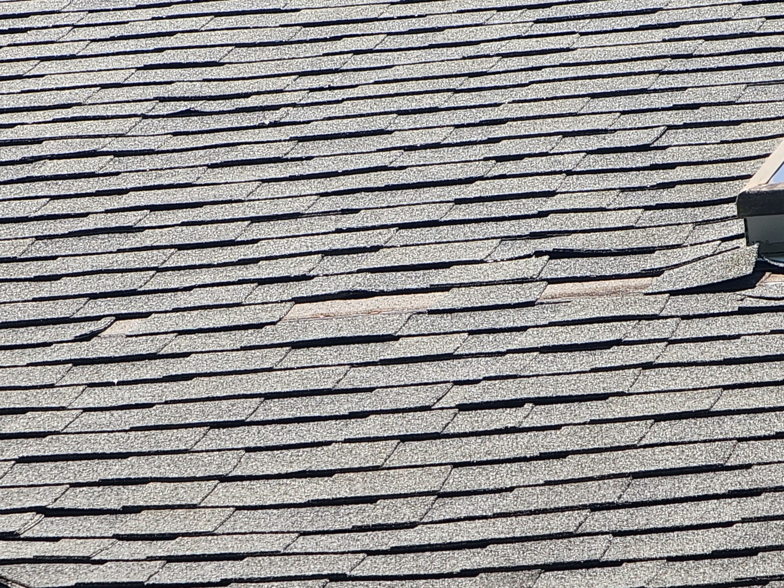 Lifted, detached shingles