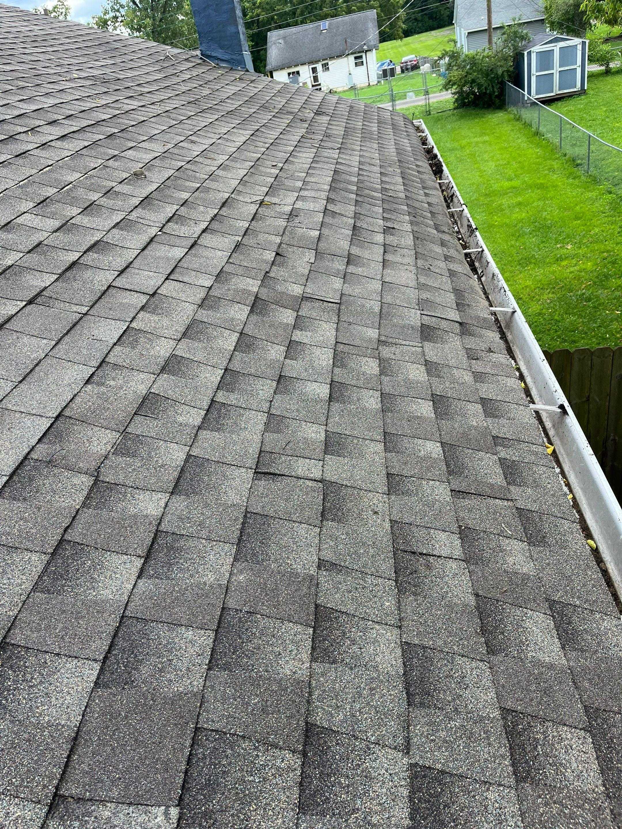 Best matched color shingles added over area.