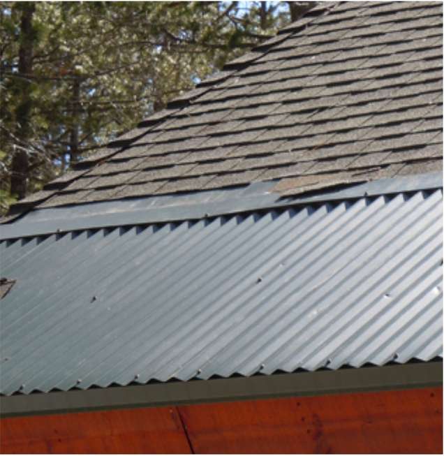 Photograph of metal transition flashing on roof.