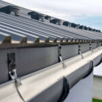 HOW MUCH SHOULD A NEW ROOF AND GUTTERS COST?