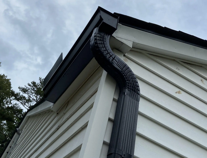 new gutters and downspouts