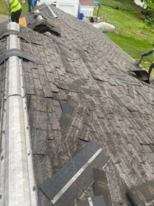 roof shingle tear off, roof ridge removal