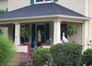 A hip porch roof addition.