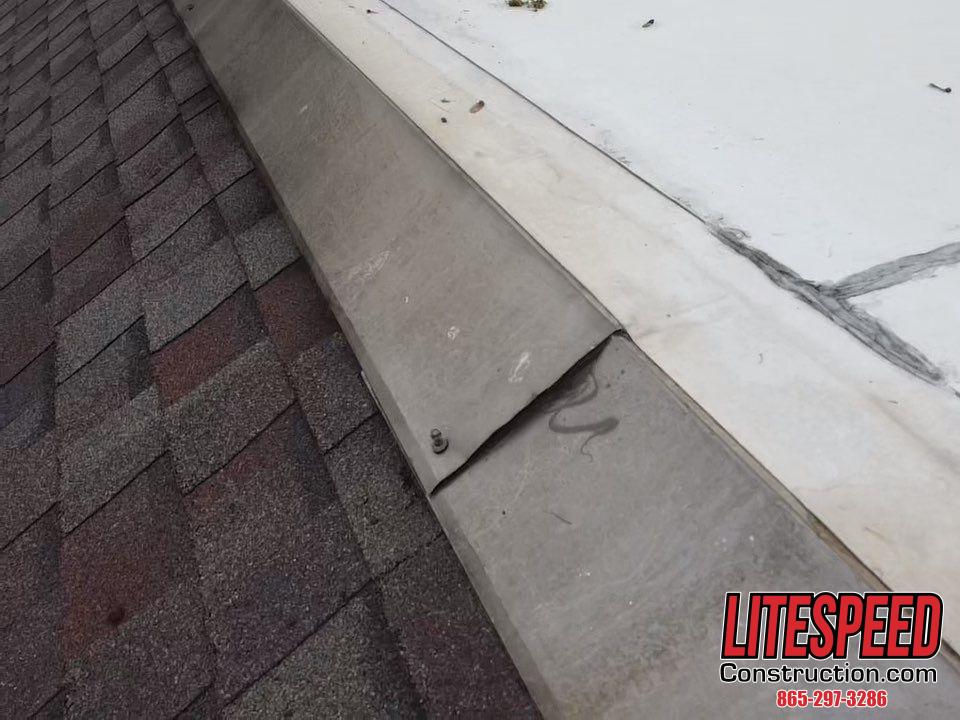 Metal flashing installation, Roof joint reinforcement, Sealed roof lap joints, Commercial roof flashing, Leak repair metal flashing, Flashing detail roofing, Roof leak prevention, Metal flashing around shingles, Roof flashing repair, Waterproof metal flashing, Flashing seam seal, Roof edge flashing, Roofing detail photo, Flashing around shingle laps, Weatherproof roof repair