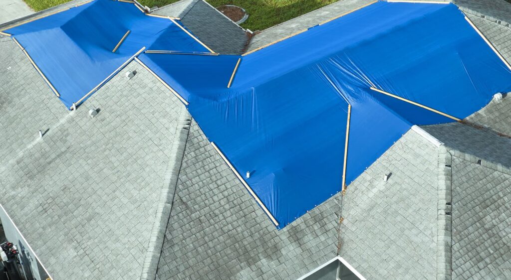 emergency roof tarping, temporary roof repair, tarp for roof damage, Knoxville storm damage repair, roof leak tarp, roof storm protection, Litespeed Construction roofing, roof tarp cost, FEMA tarp guidelines, insurance roof tarp, tarp roofing services, tarping vs repair, roof damage Knoxville TN, roof restoration Knoxville, best roofing contractors TN