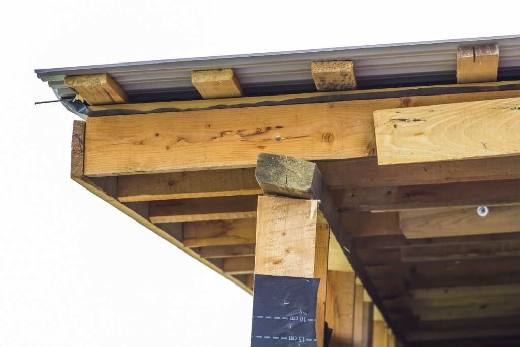 porch roof support, better for porch roof support, 4x4 vs 6x6 posts, load-bearing porch posts, deck support posts, porch post size, structural porch supports, porch roof load capacity, post size for porch roof, 6x6 porch support pros, porch building code, Tennessee porch code, roofing contractor Knoxville, porch roof framing, Litespeed Construction Knoxville
