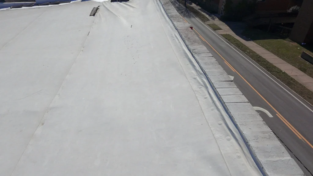 commercial wall cap repair, wall cap repair Knoxville TN, commercial parapet repair, metal wall cap repair, roof wall cap repair, parapet wall flashing repair, commercial roof edge repair, wall cap replacement Knoxville, commercial roofing Knoxville TN, parapet leak repair, flat roof wall cap repair, commercial building leak repair, metal parapet cap repair, Knoxville commercial roofing, roof edge flashing repair