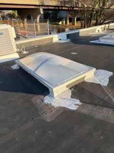 commercial roof TPO overlay including skylights in Knoxville TN 37902, TPO overlay for leaking EPDM commercial roof Knoxville, flat commercial roof with skylights repair Knoxville TN, commercial roof leak mitigation Knoxville TN, TPO overlay over existing EPDM membrane, commercial roof moisture intrusion repair Knoxville, scupper drain sealing commercial roof Knoxville, commercial roof insulation replacement after leak, skylight curb build up commercial roof, commercial roof core sampling for drainage issues, commercial roof retrofit Knoxville TN, Knoxville TN commercial roof overlay contractor