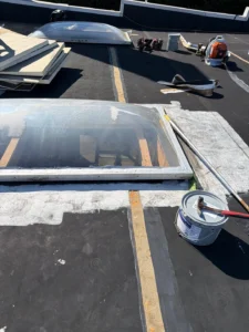 commercial roof TPO overlay including skylights in Knoxville TN 37902, TPO overlay for leaking EPDM commercial roof Knoxville, flat commercial roof with skylights repair Knoxville TN, commercial roof leak mitigation Knoxville TN, TPO overlay over existing EPDM membrane, commercial roof moisture intrusion repair Knoxville, scupper drain sealing commercial roof Knoxville, commercial roof insulation replacement after leak, skylight curb build up commercial roof, commercial roof core sampling for drainage issues, commercial roof retrofit Knoxville TN, Knoxville TN commercial roof overlay contractor