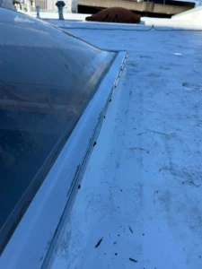 commercial roof TPO overlay including skylights in Knoxville TN 37902, TPO overlay for leaking EPDM commercial roof Knoxville, flat commercial roof with skylights repair Knoxville TN, commercial roof leak mitigation Knoxville TN, TPO overlay over existing EPDM membrane, commercial roof moisture intrusion repair Knoxville, scupper drain sealing commercial roof Knoxville, commercial roof insulation replacement after leak, skylight curb build up commercial roof, commercial roof core sampling for drainage issues, commercial roof retrofit Knoxville TN, Knoxville TN commercial roof overlay contractor