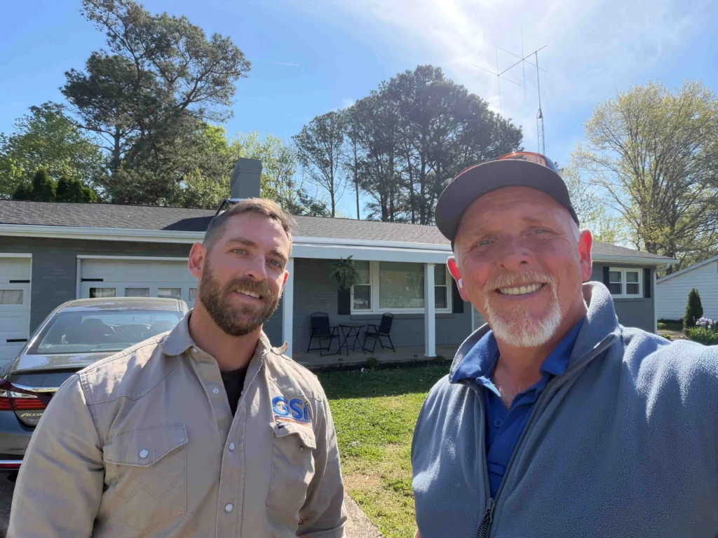 Billy Price with Casey Dochod in front of his newly installed roof in Knoxville, TN 37912