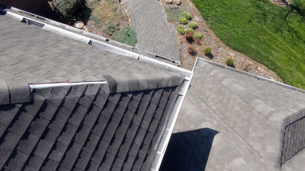 missing hip shingles, missing gutter guards, shingle repair, roof replacement