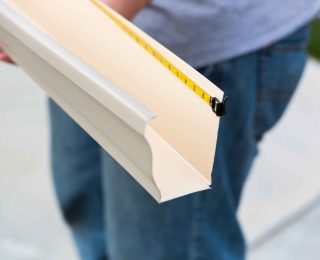 Gutter Options for a Porch Roof, porch roof gutters, best gutters for porches, gutter installation Knoxville, porch drainage solutions, aluminum porch gutters, seamless gutters porch, copper gutters porch roof, half-round gutters porch, porch roof water damage, custom porch gutters, box gutters porch, gutter guard porch roof, gutter sizing porch, Knoxville porch gutters, gutter repair Knoxville